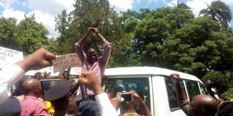 ORDER FROM ABOVE:  Police re-arrest human rights activist Bon Kalindo