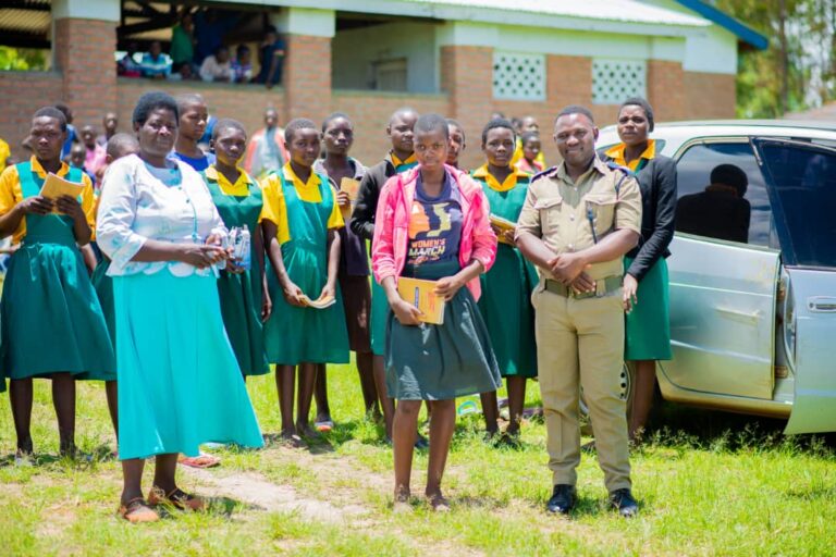 APOLISI NDI ABALE ATHU:  Dedza Police Officer Cassim Manda Donates to Female Learners