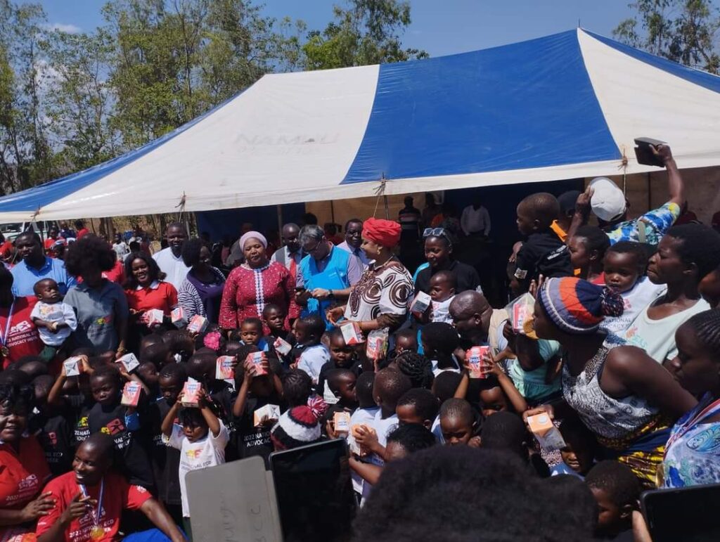 Hon. Patricia Kaliati poses with kids in Chiradzulu during launch of 2022 ECD Advocacy Week