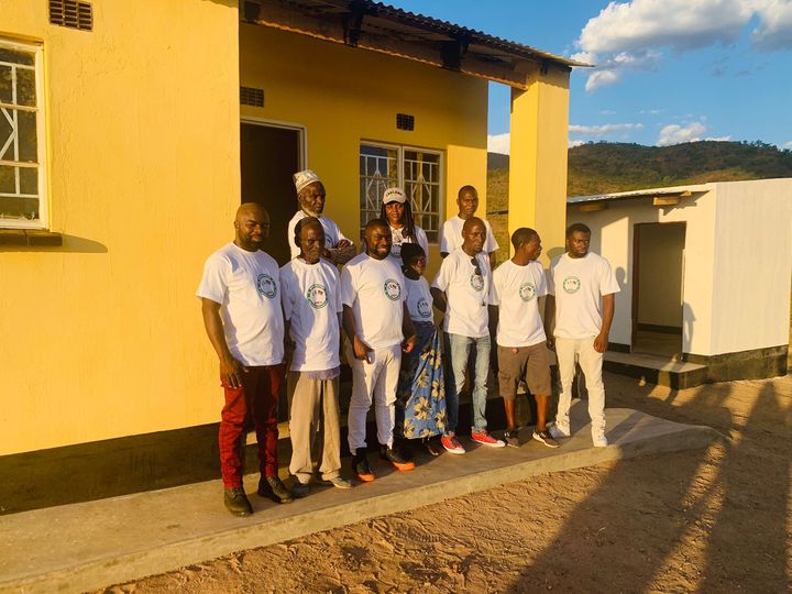 Association of Malawians in Ireland builds house for elderly woman in Mangochi